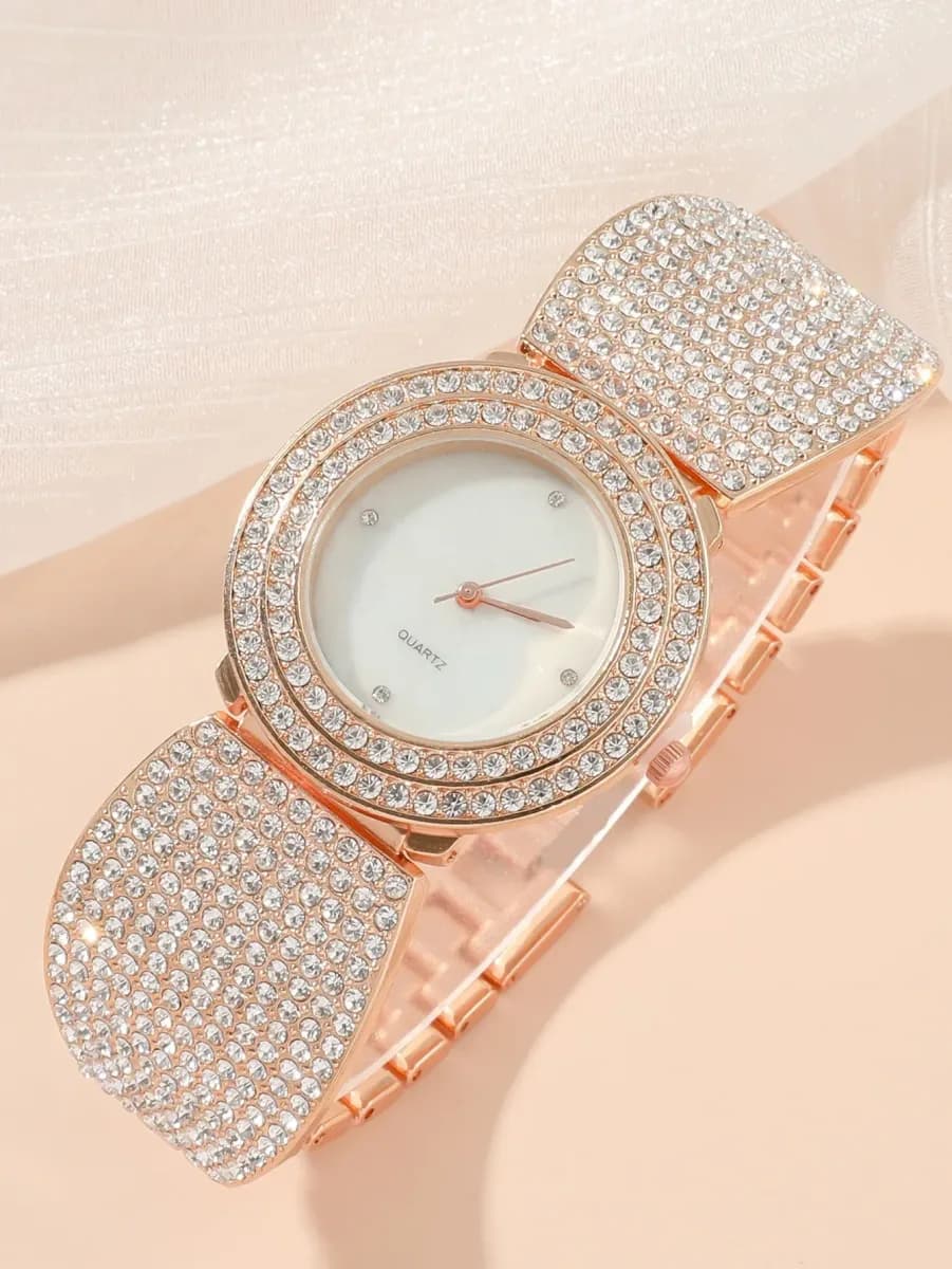 rhinestone watch with wide sparkling band and white dial