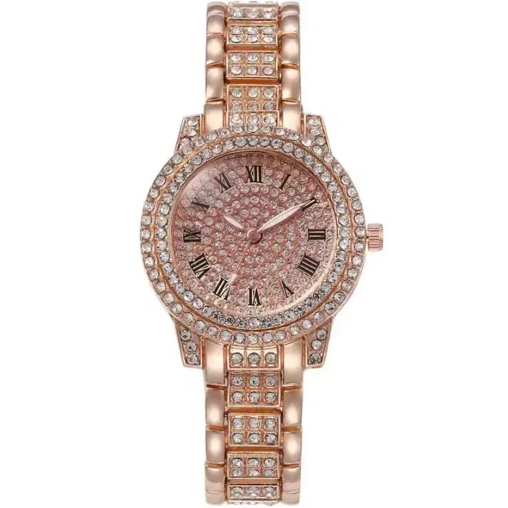 rose gold tone rhinestone watch with Roman numerals