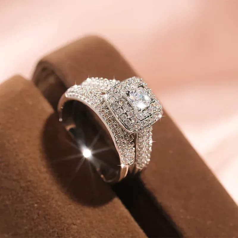 square halo cubic zirconia engagement ring stacked with its pave band