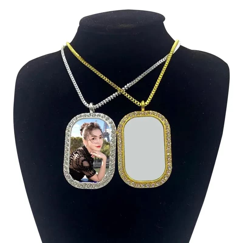 rectangle photo pendant necklaces with rhinestone frames on a display bust
