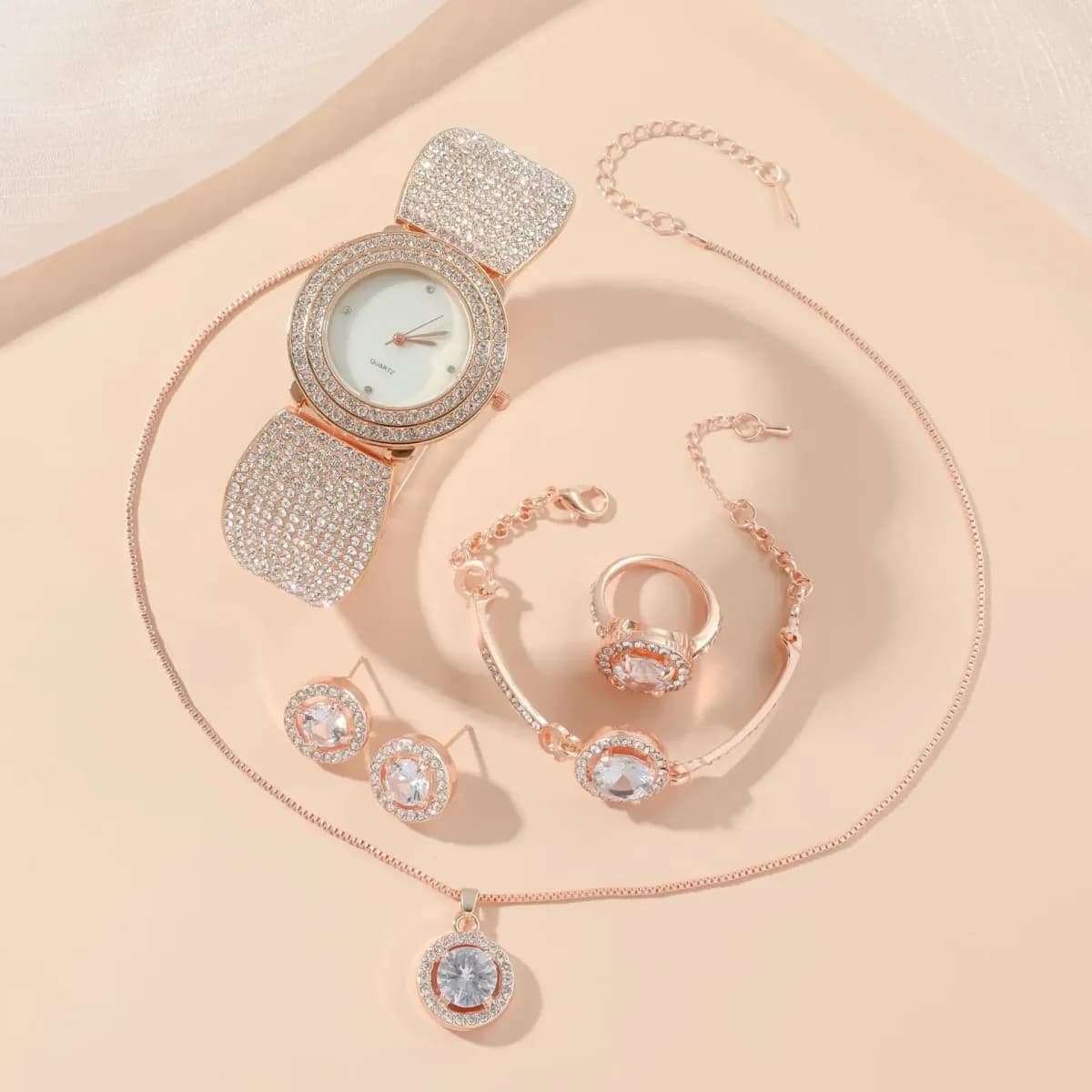 rhinestone watch and jewelry set for women, five pieces in rose gold tone