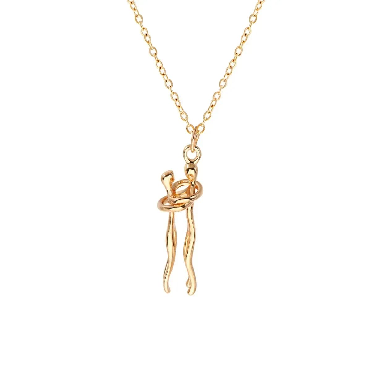 embracing couple pendant necklace in gold tone