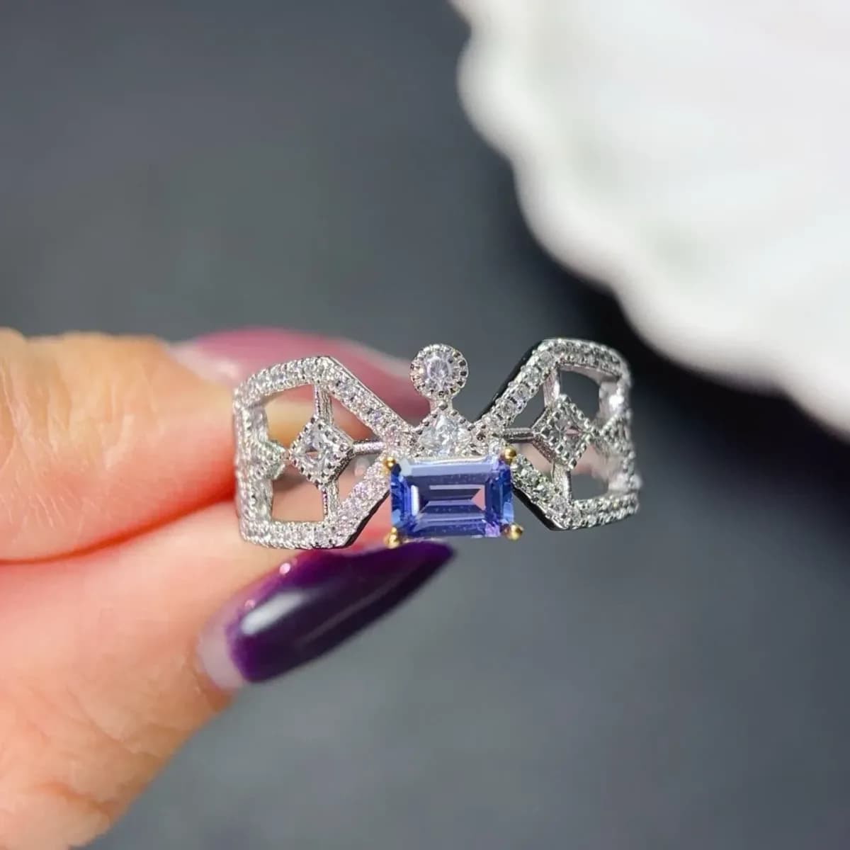 tanzanite ring in 925 sterling silver with an openwork bow design